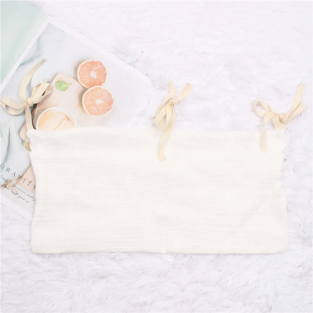 Space-saving crib organizer, ideal for newborn essentials and feeding