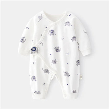 Top-down view of unisex cotton newborn romper, print pattern, showing footless design