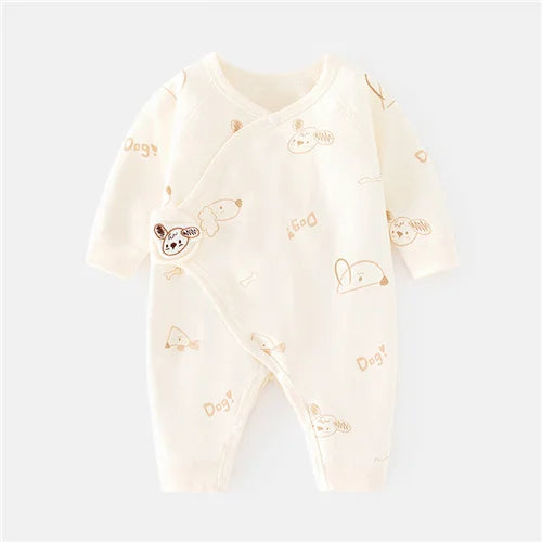 Close-up of soft cotton material and print on unisex newborn romper, hypoallergenic baby wear