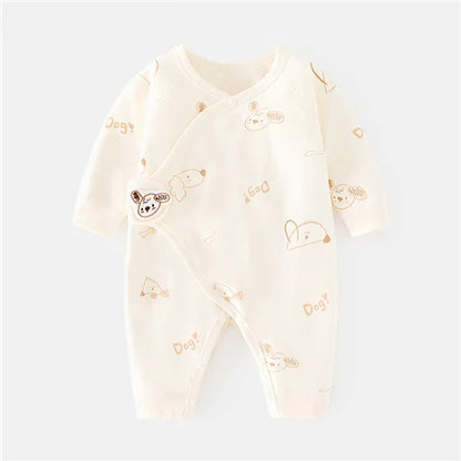 Close-up of soft cotton material and print on unisex newborn romper, hypoallergenic baby wear