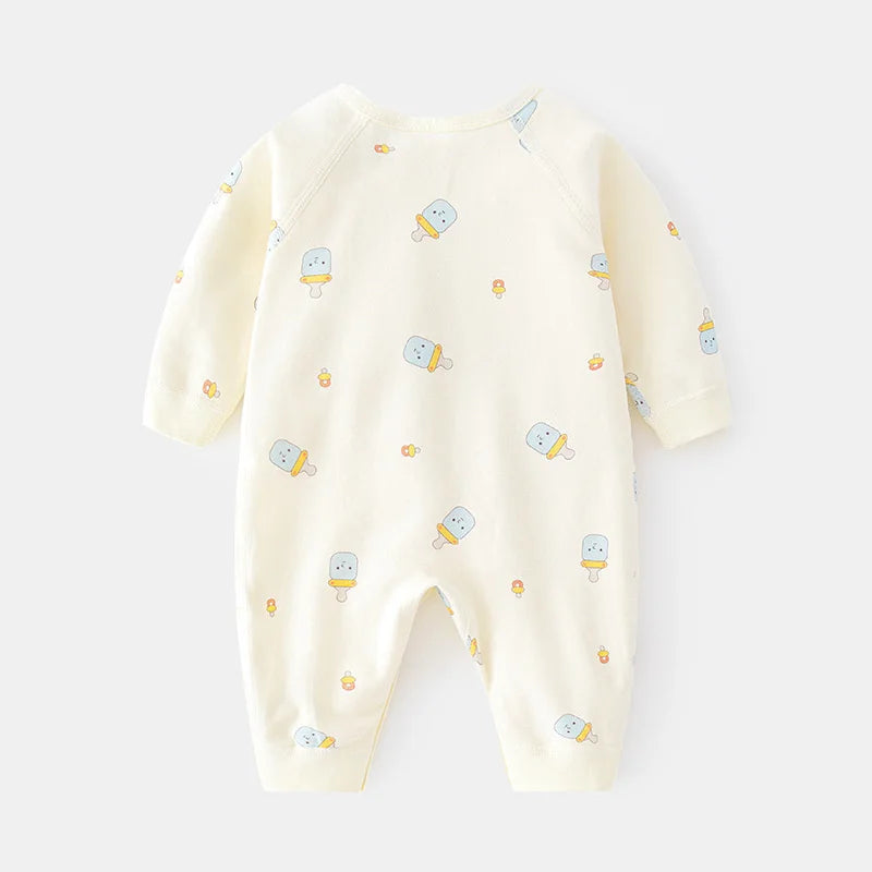 Close-up of soft print design on unisex cotton newborn romper, gentle fabric texture