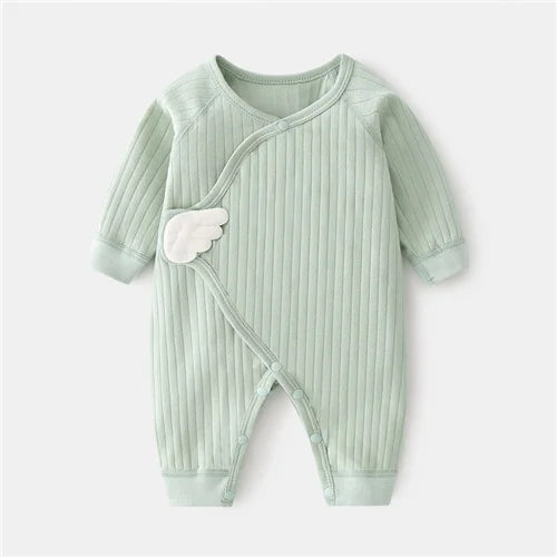 Cotton newborn romper, soft print, unisex, laid flat to show full design and size 0-3 months