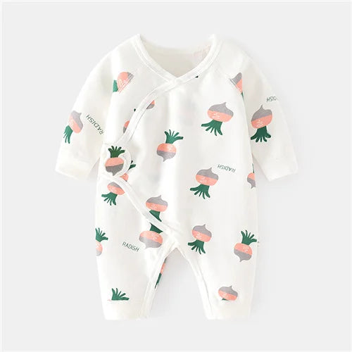 Soft print cotton baby onesie, unisex, close-up of collar and shoulder snaps for easy dressing