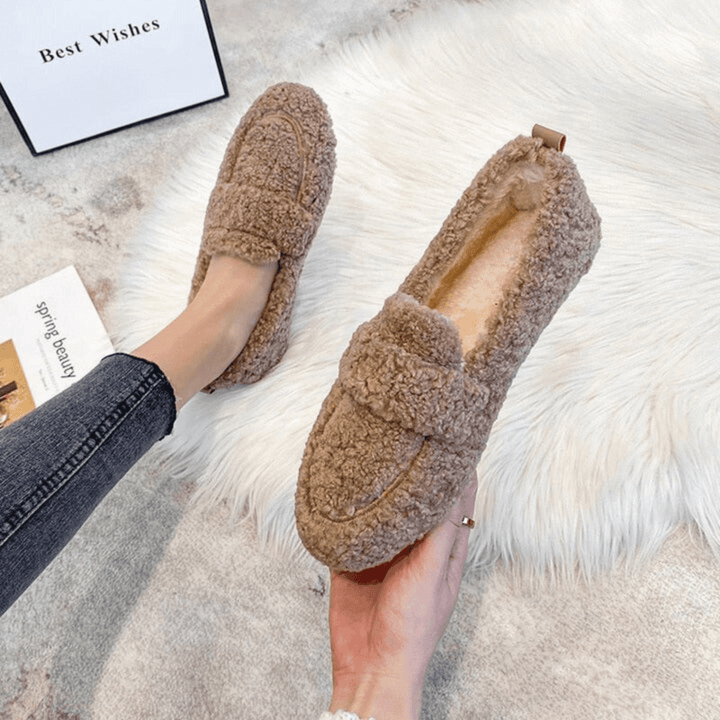 Unisex cozy winter house shoes for ultimate warmth and comfort at home.