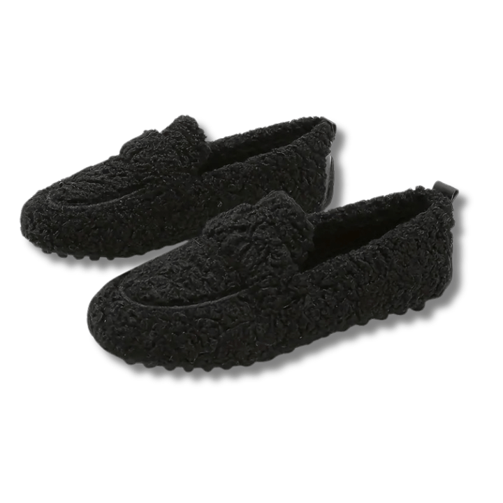 Plush unisex house shoes, ensuring cozy home comfort and warmth during winter.