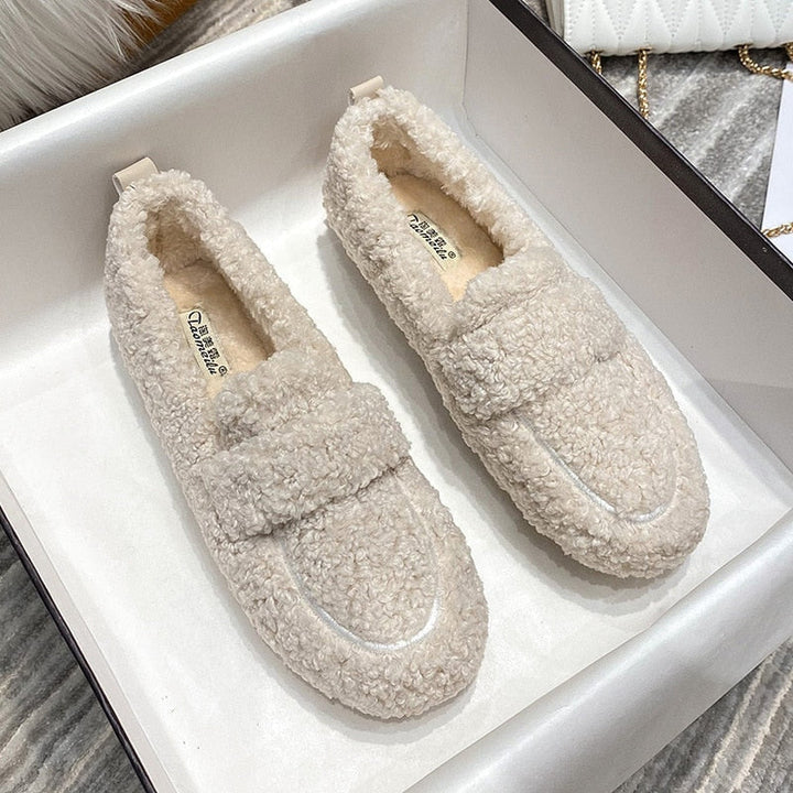 Warm plush indoor slippers for men & women. Cozy winter house shoes for ultimate comfort.