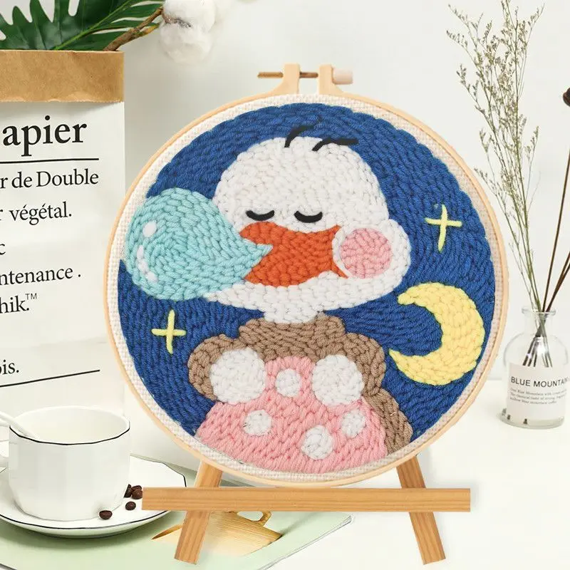 Finished punch needle art piece as an example of what can be made with the home decor kit