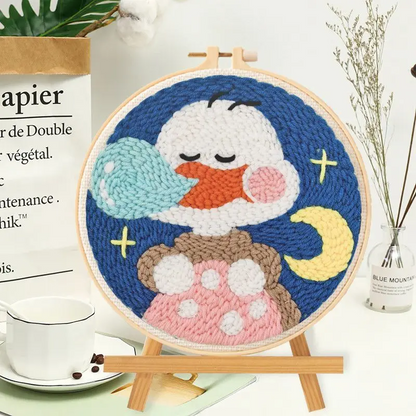 Finished punch needle art piece as an example of what can be made with the home decor kit