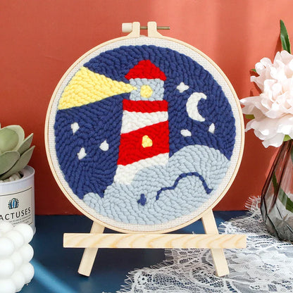 Beginner-friendly punch needle embroidery kit including a wooden frame and varied yarn colors