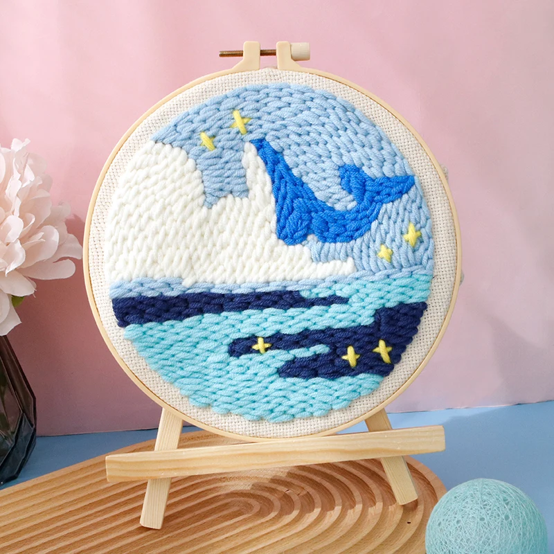 Assortment of vibrant yarns included in the unisex punch needle art kit for creative projects