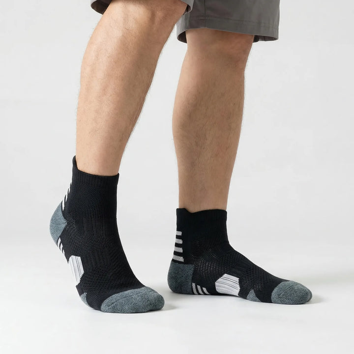 Durable cushioned ankle sports socks for unisex. Enhanced comfort, non-slip grip for running, training & athletic use.