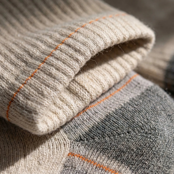Cushioned mid-calf hiking socks, unisex. Performance, moisture-wicking, breathable for trail comfort.