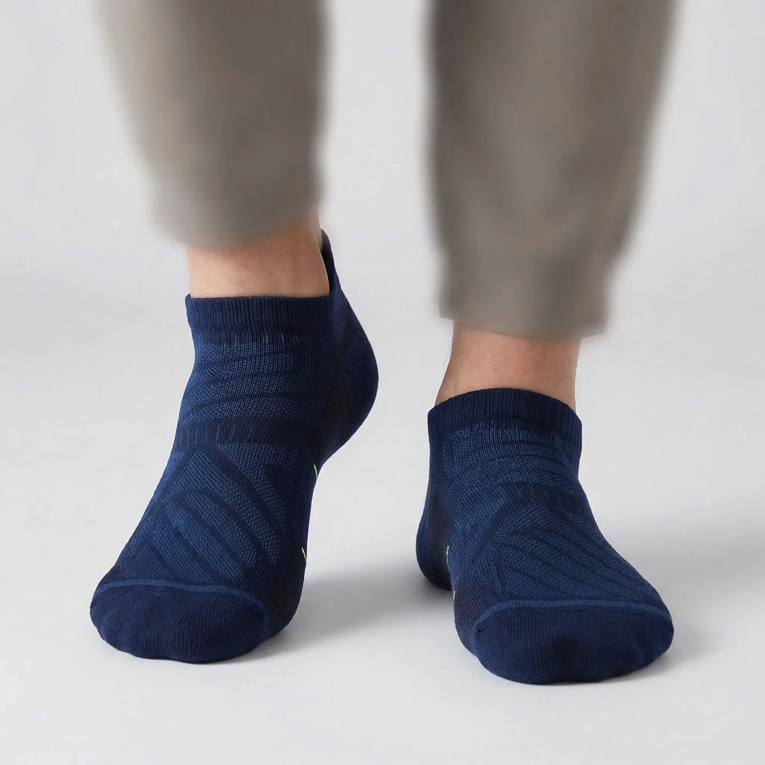 Moisture-wicking cushioned no-show ankle socks for men & women. Ideal for running, gym, and all active wear.