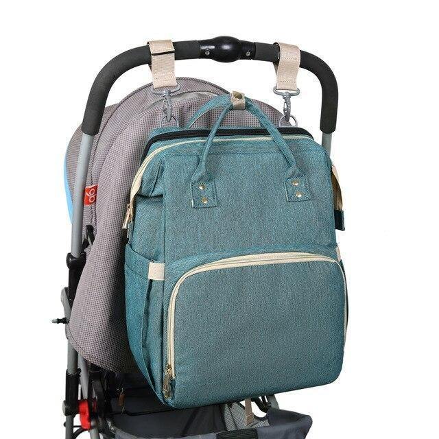 Unisex waterproof baby bag demonstrating its large storage capacity for parent essentials.