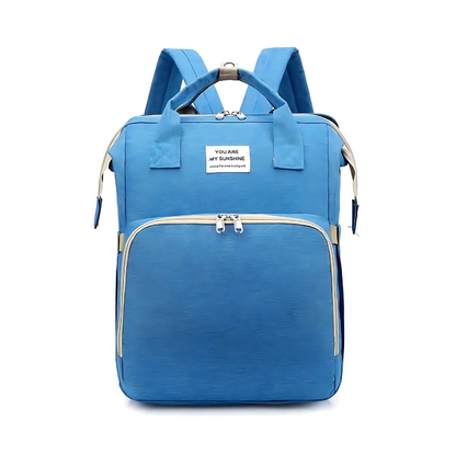 Side view of modern unisex diaper bag backpack, highlighting its ergonomic and comfortable straps.