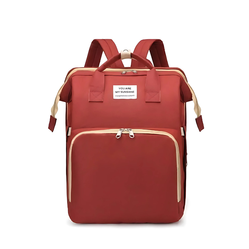 Interior of diaper bag backpack showing organized storage for baby essentials and personal items.