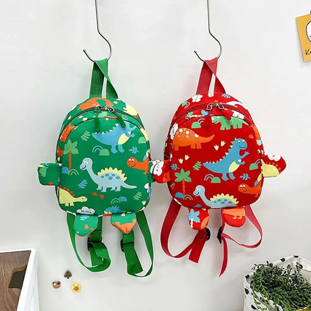 Toddler wearing a unisex dinosaur backpack, ideal kids school bag for kindergarten, comfortable & lightweight