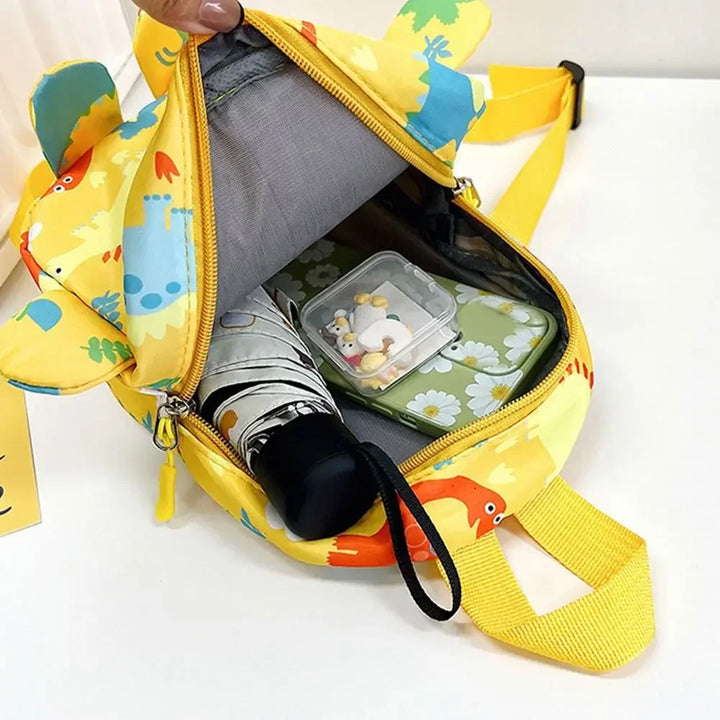 Side view of a spacious dinosaur toddler backpack, multi-compartment kids school bag, water resistant nylon