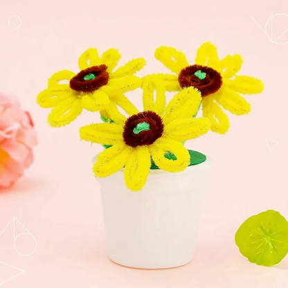 Finished vibrant flowerpot from a DIY craft kit, adding charm to home decor