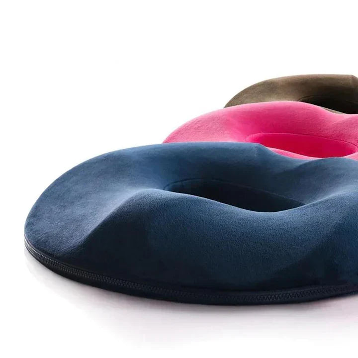 Unisex donut seat cushion for tailbone, hemorrhoid & coccyx pain relief. Memory foam, ergonomic design.
