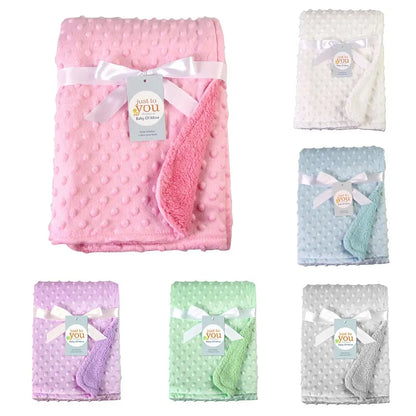 Unisex double layer cotton baby blanket, soft and breathable, perfect for newborn swaddling and comfort.
