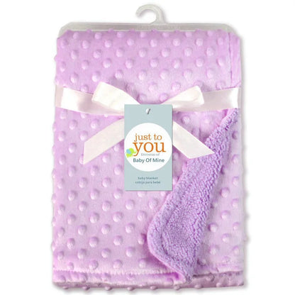 Unisex double layer cotton baby blanket, showcasing its versatility for swaddling, cuddling, and more.