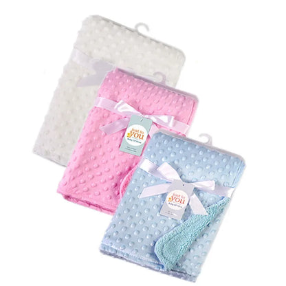 Detail of the woven pattern on a breathable double layer cotton baby blanket, perfect for infant use.