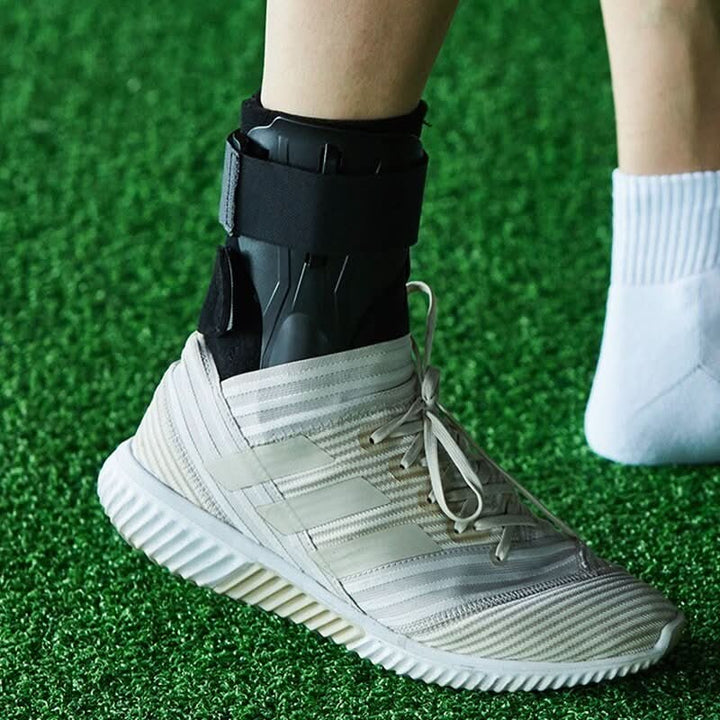 Unisex ankle support with double stabilizers for injury prevention in fitness activities.