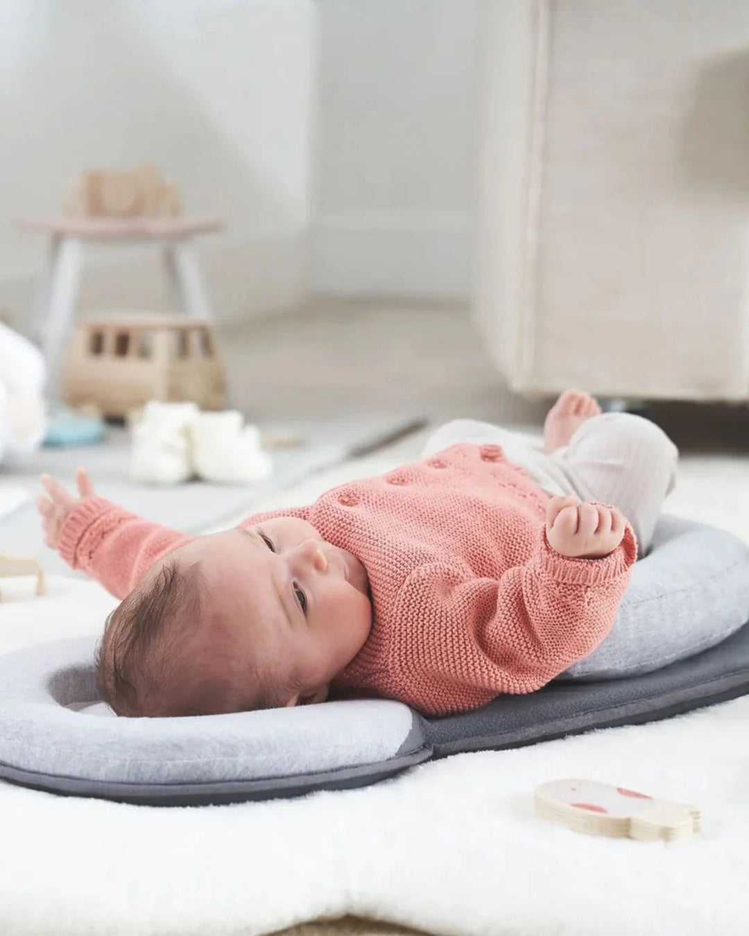 Unisex ergonomic baby sleep nest for infants, plush white cotton, safe sleep solution