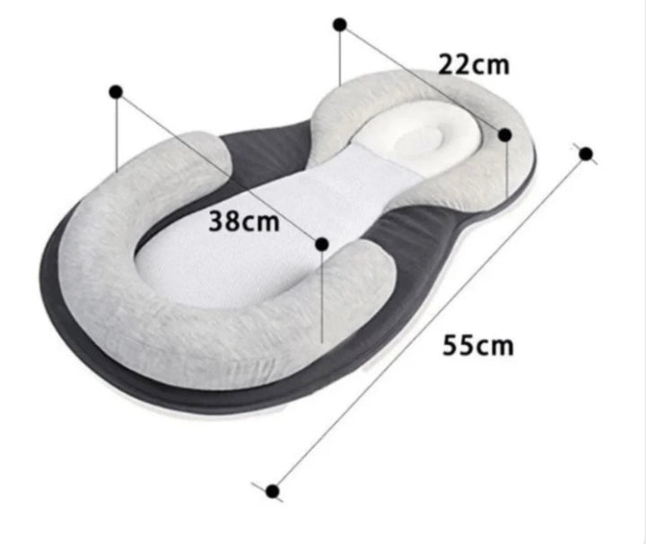 White baby sleep nest, portable and lightweight, perfect for travel or bedside use for newborns