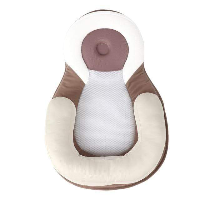 Infant sleep positioner with head support. Promotes healthy sleep and prevents flat spots.