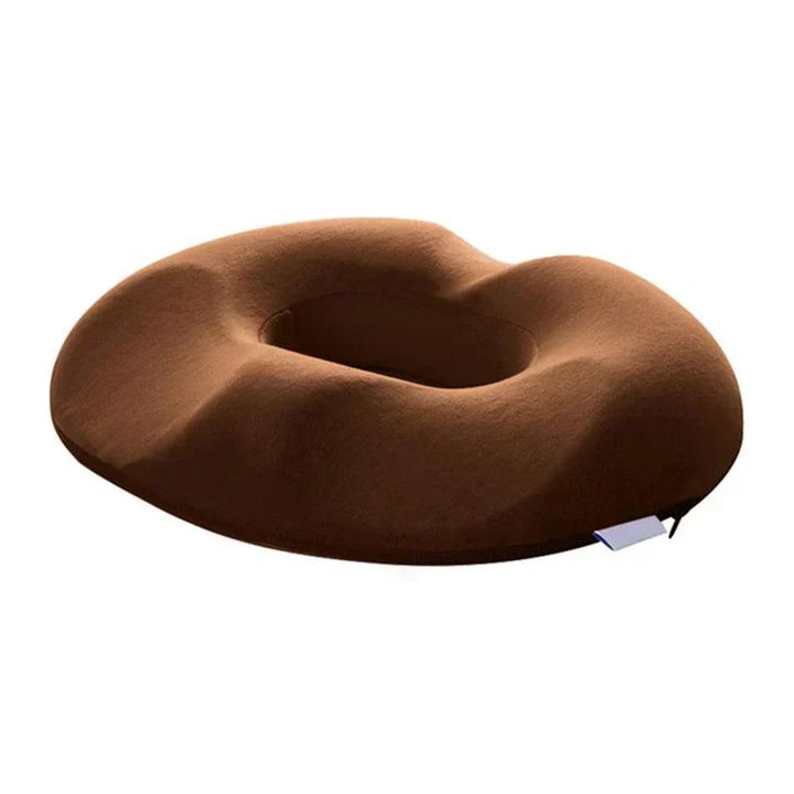 Ergonomic donut seat cushion for office chairs. Provides tailbone pain relief & posture support for long workdays.