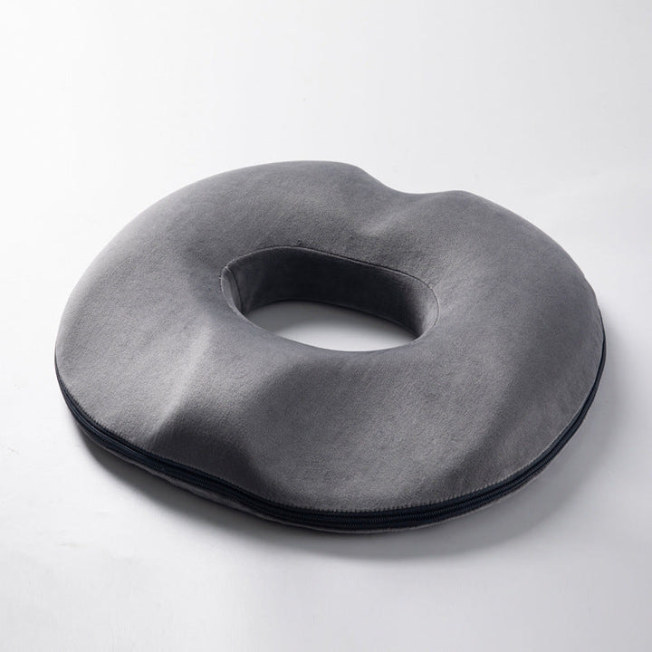 Versatile ergonomic donut seat cushion for home, office, and car. Offers tailbone pain relief & posture support.