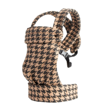 Adjustable Mei Tai baby carrier in a lifestyle shot, showcasing outdoor use by parents
