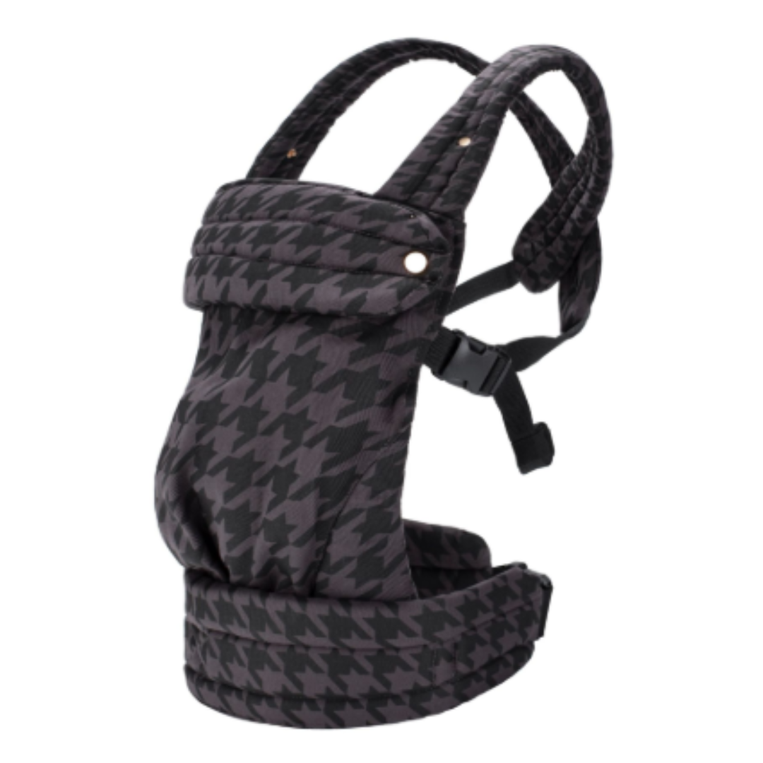 Toddler comfortably seated in a breathable Mei Tai baby carrier, secure and ergonomic