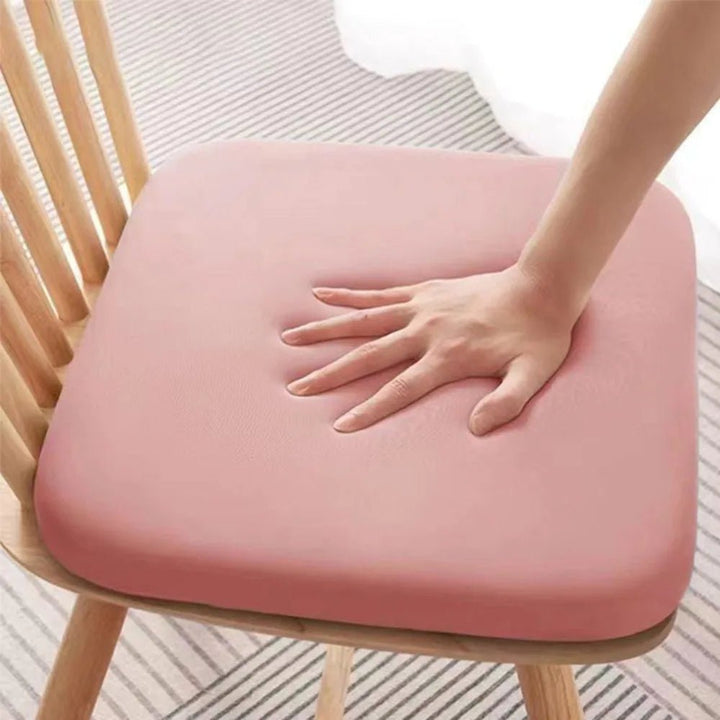 Side view of ergonomic non-slip seat cushion, showing contoured design for posture support & comfort.