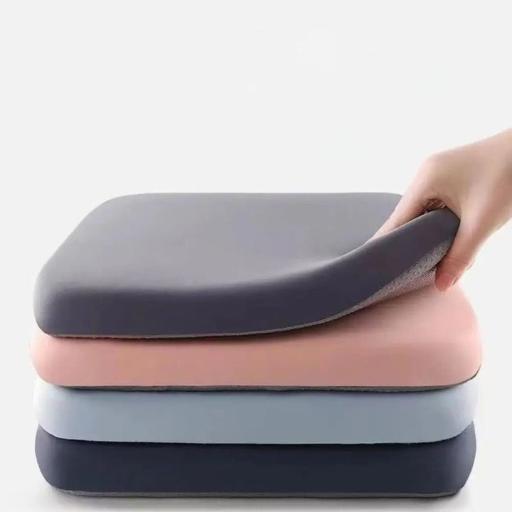 Travel-friendly non-slip ergonomic seat cushion for car & plane, providing comfort & posture support.