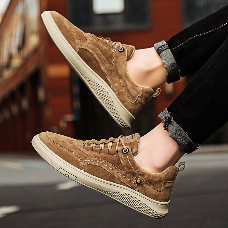 Versatile lace-up unisex sneakers, offering classic style and everyday comfort.