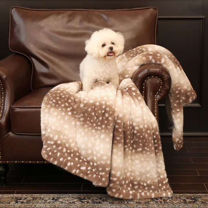 Luxurious faux fur deer blanket, a plush and warm reversible throw perfect for bedroom comfort.