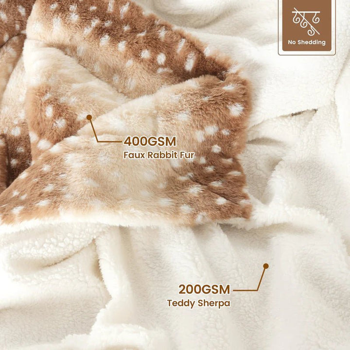 Cozy faux fur deer blanket, a plush reversible throw for winter warmth & comfort; great gift idea.