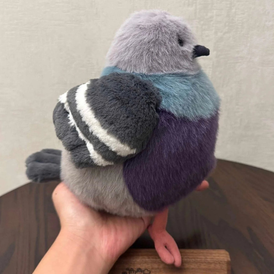 Adorable grey pigeon stuffed animal, a soft unique plush toy designed for cozy cuddles & playtime fun.