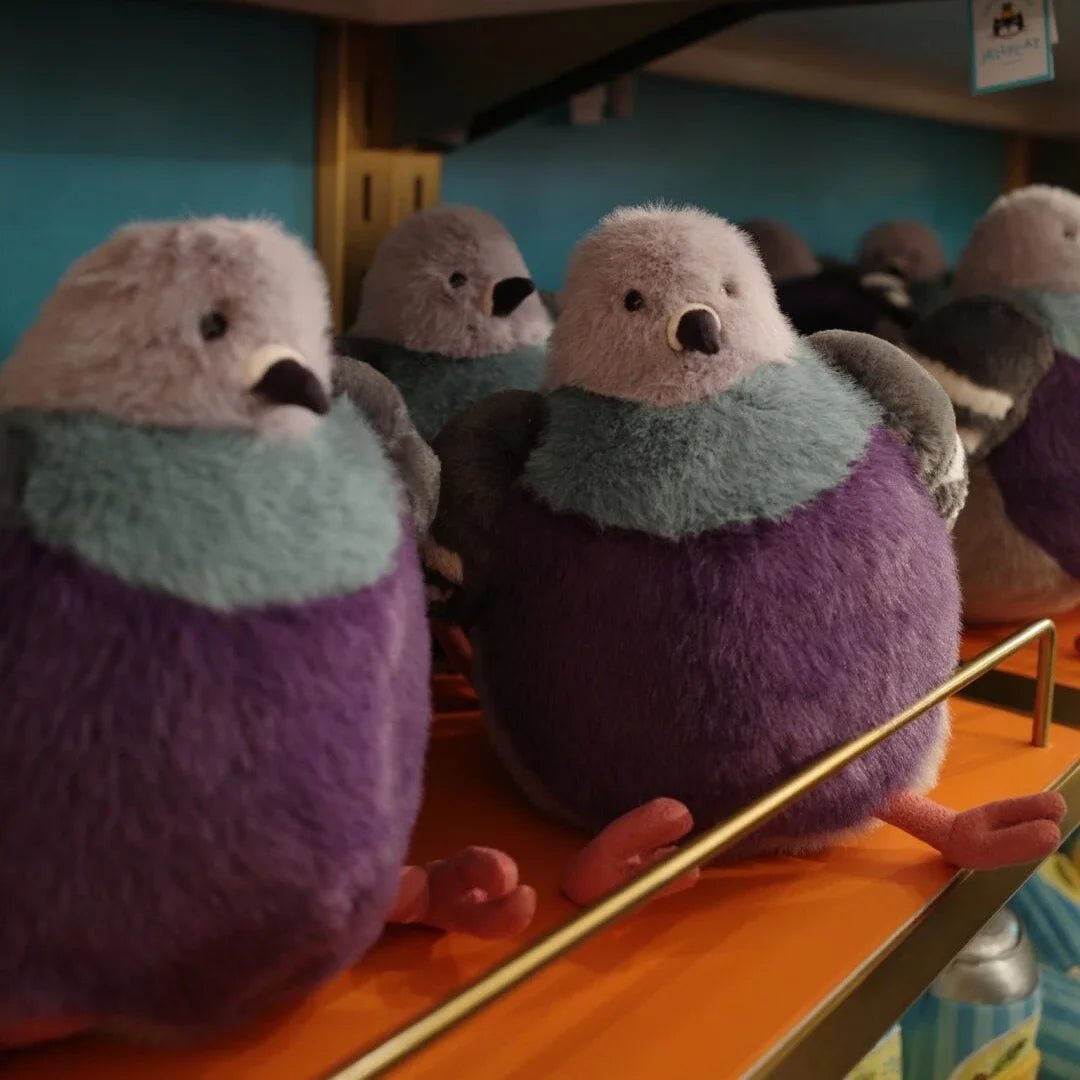 Soft unisex pigeon toy, a unique plush animal for cuddles, featuring fluffy texture and gentle design.