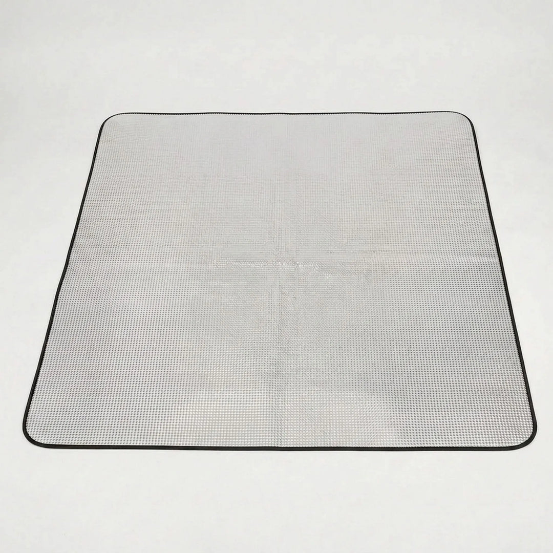 Durable unisex camping mat, foldable and reflective. Ideal for outdoor sleeping, hiking, and picnic insulation.