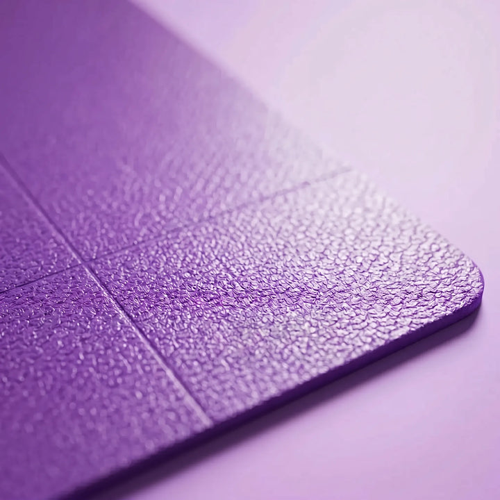 Durable TPE travel yoga mat, non-slip & foldable for easy transport; ideal for pilates & workouts.