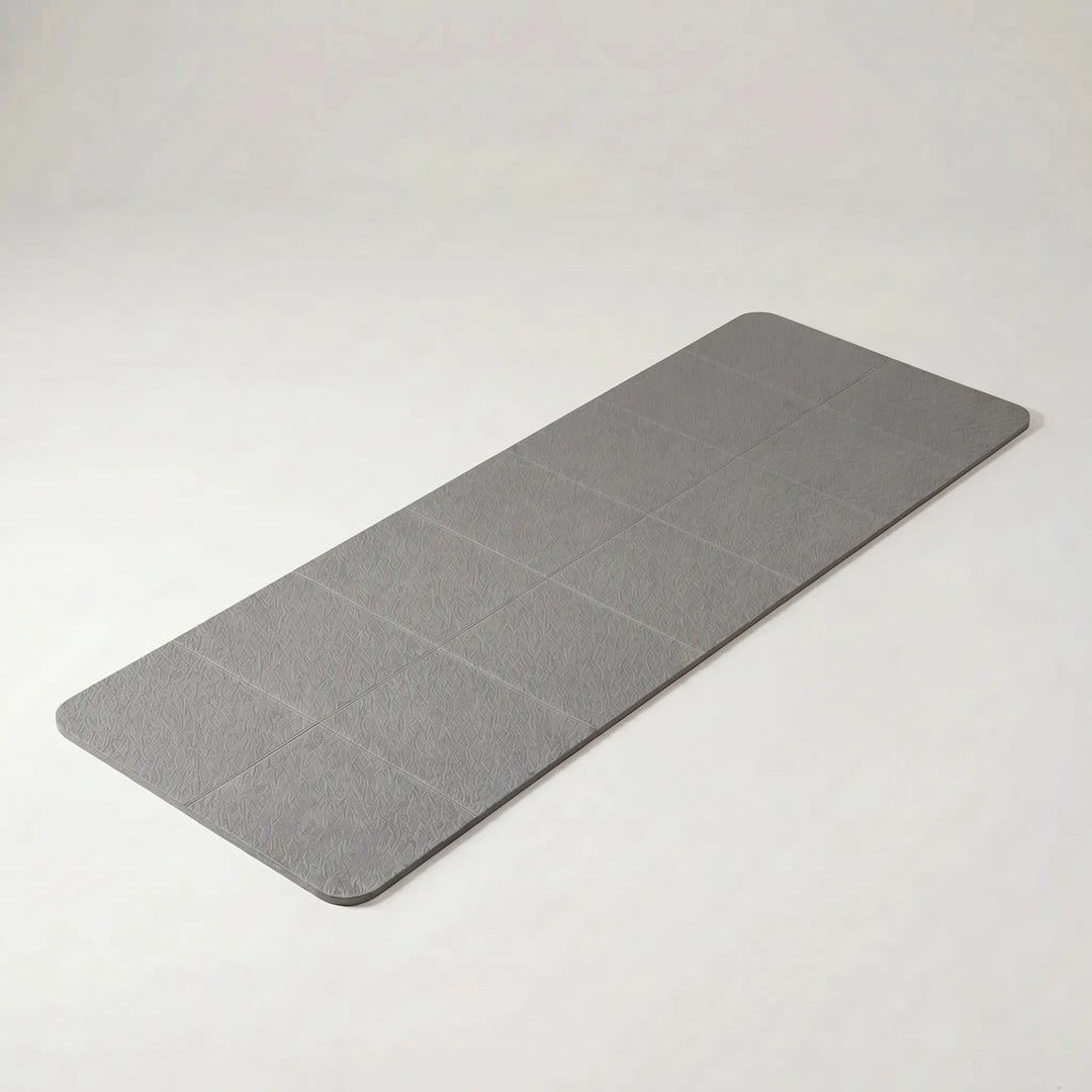 Unisex lightweight foldable TPE yoga mat. Non-slip exercise mat for travel, yoga & general fitness workouts.