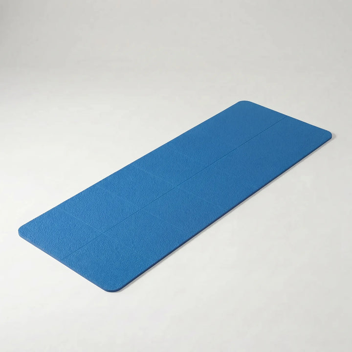 Convenient foldable travel yoga mat, lightweight & non-slip TPE for easy carrying & stable exercise sessions.