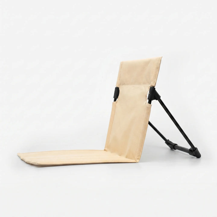 Versatile unisex folding floor chair for camping, picnics, concerts. Portable ground seating with strong back support.
