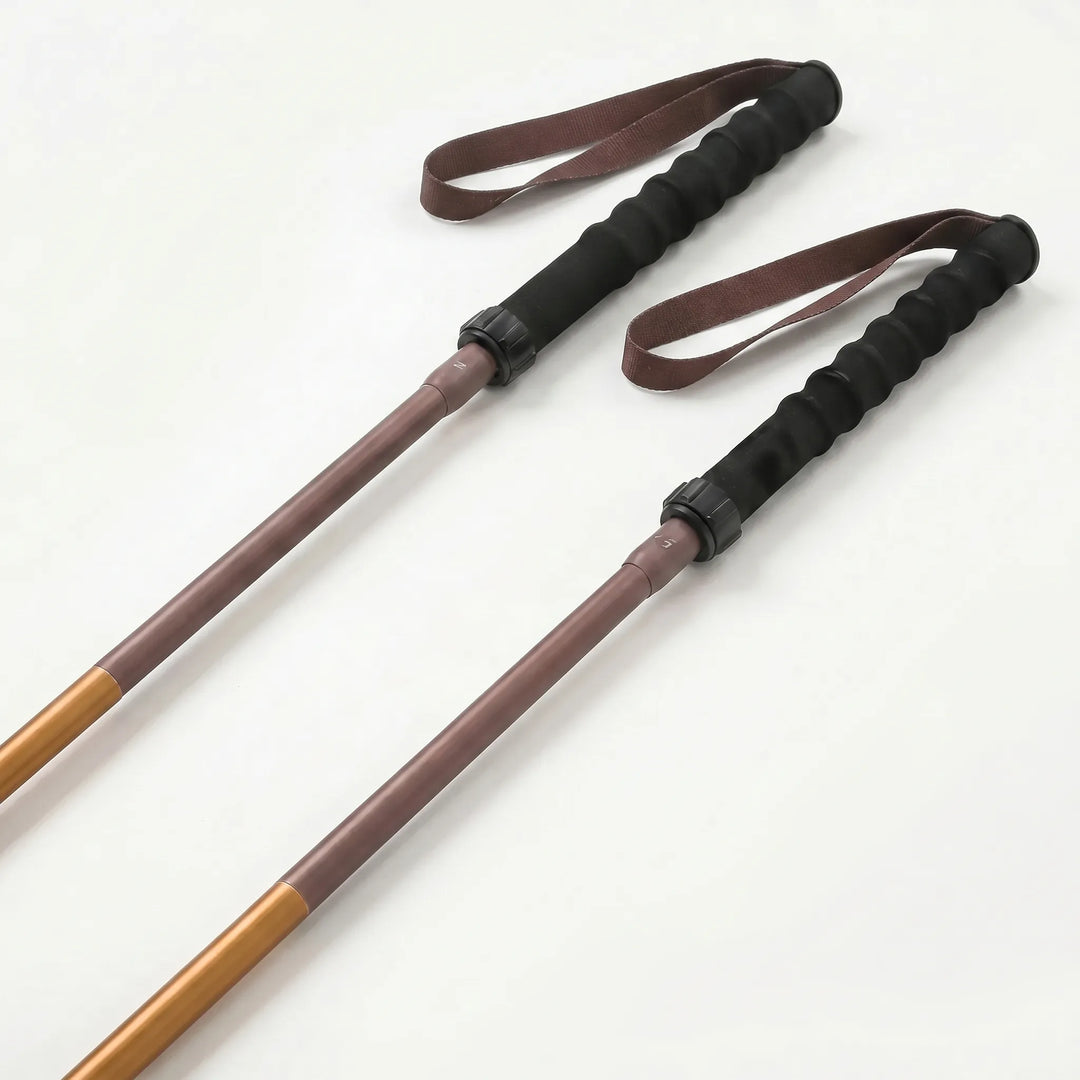 Lightweight aluminum collapsible hiking pole with quick lock, perfect outdoor gear for travel.