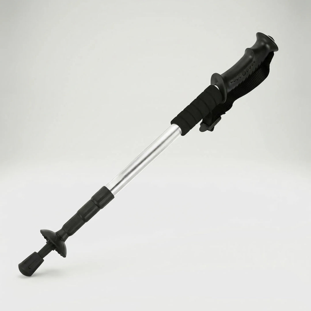 Shock-absorbing 4-section folding trekking pole, compact & stable for comfortable hiking.