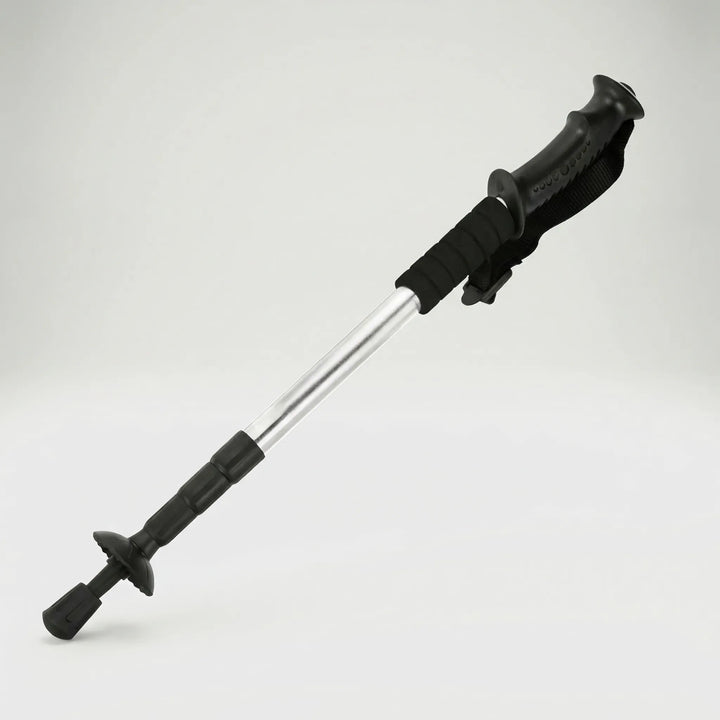 Shock-absorbing 4-section folding trekking pole, compact & stable for comfortable hiking.